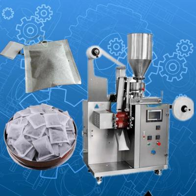 Tea bag making machine with string and label